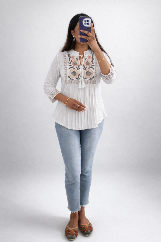 Celira White Embroidered Peplum Top